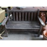 A weathered teak slatted garden bench, length 128cm, depth 62cm, height 91cm