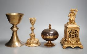 A decorative ormolu inkwell, 20cm high, a Baroque style candlestick, a chalice stamped W IV,