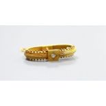 A Victorian yellow metal and diamond set scarf clip, 28mm, gross 4.3 grams.