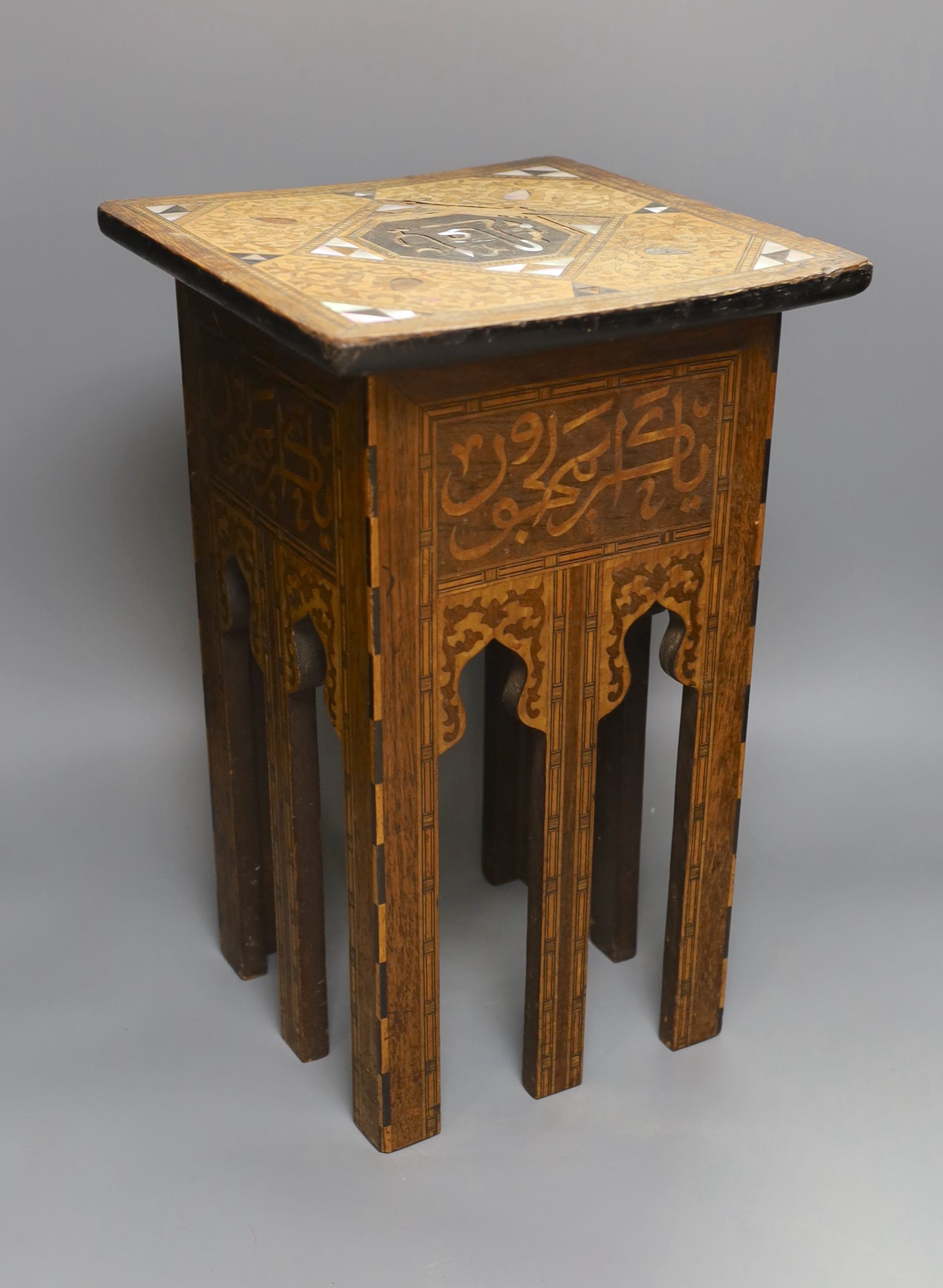 A Middle-Eastern inlaid plant stand - 43cm tall