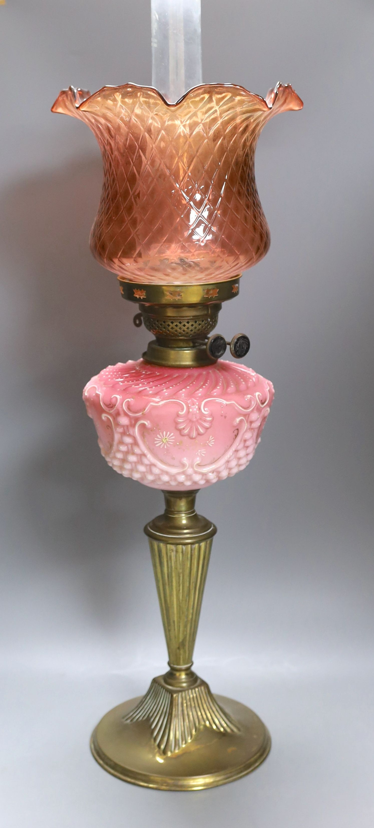 A Victorian brass and coloured glass oil lamp - 70cm high