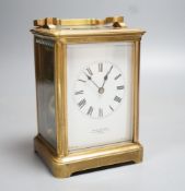 A French brass carriage clock, retailed by Drew and Sons, 166 Leadenhall Street London. 14.5cm (