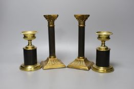 Two pairs of two-colour brass candlesticks, tallest 21cm