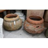 A pair of circular terracotta garden planters, diameter 50cm, height 34cm (damaged)