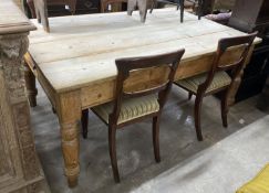 A Victorian retangular pine kitchen dining table, fitted with a later drawer, width 168cm, depth
