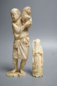 A 19th century Japanese ivory okimono of a man and rabbit together with an early 20th century