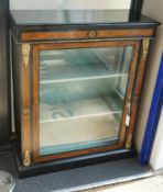 A pair of late Victorian ebonised amboyna banded pier cabinets, width 83cm, depth 32cm, height