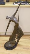 A large modern bronze of a male dancer, unsigned