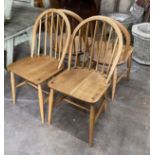 A set of four 1950's Ercol elm and beech chairs