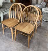 A set of four 1950's Ercol elm and beech chairs