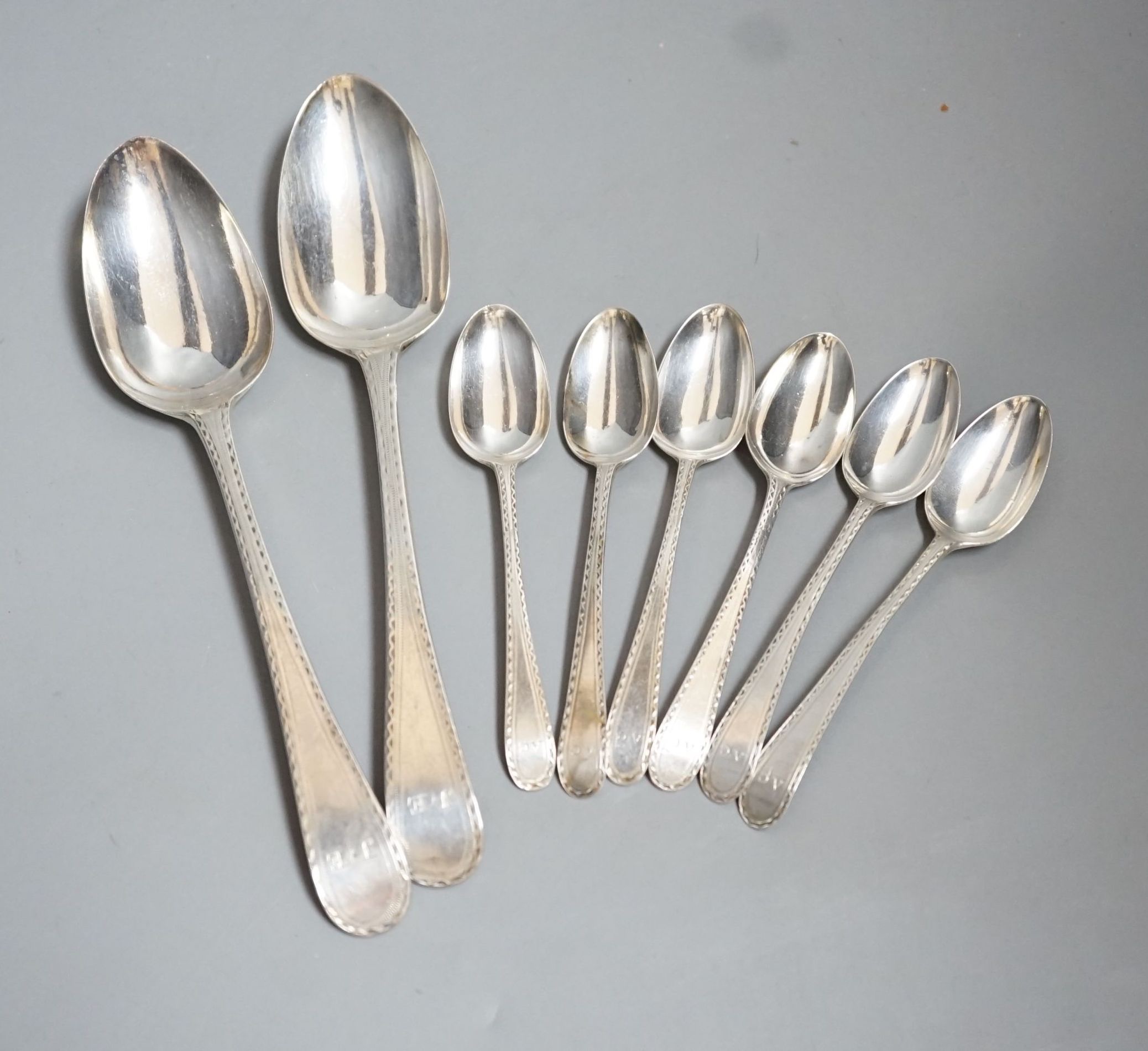 A set of silver George III bright cut engraved silver Old English pattern teaspoons, by Hester