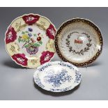 A Chamberlains Worcester armorial plate, a Worcester pinecone pattern plate, c.1775 and a