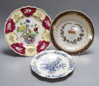 A Chamberlains Worcester armorial plate, a Worcester pinecone pattern plate, c.1775 and a