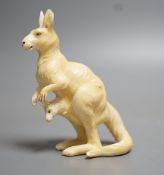 An unusual Japanese ivory okimono of a kangaroo with a Joey in its pouch, Meiji period. 8cm tall