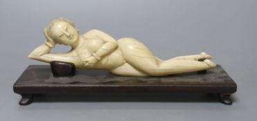 An ivory female nude medicine figure, on plinth, 20cm