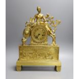 A decorative ormolu mantle clock with Shepardess - 40cm high