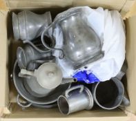 A quantity of pewter jugs and wares