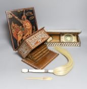 A 19th century ivory handled fly whisk, ivory inlaid sandalwood glove box, carved bone snuff box,
