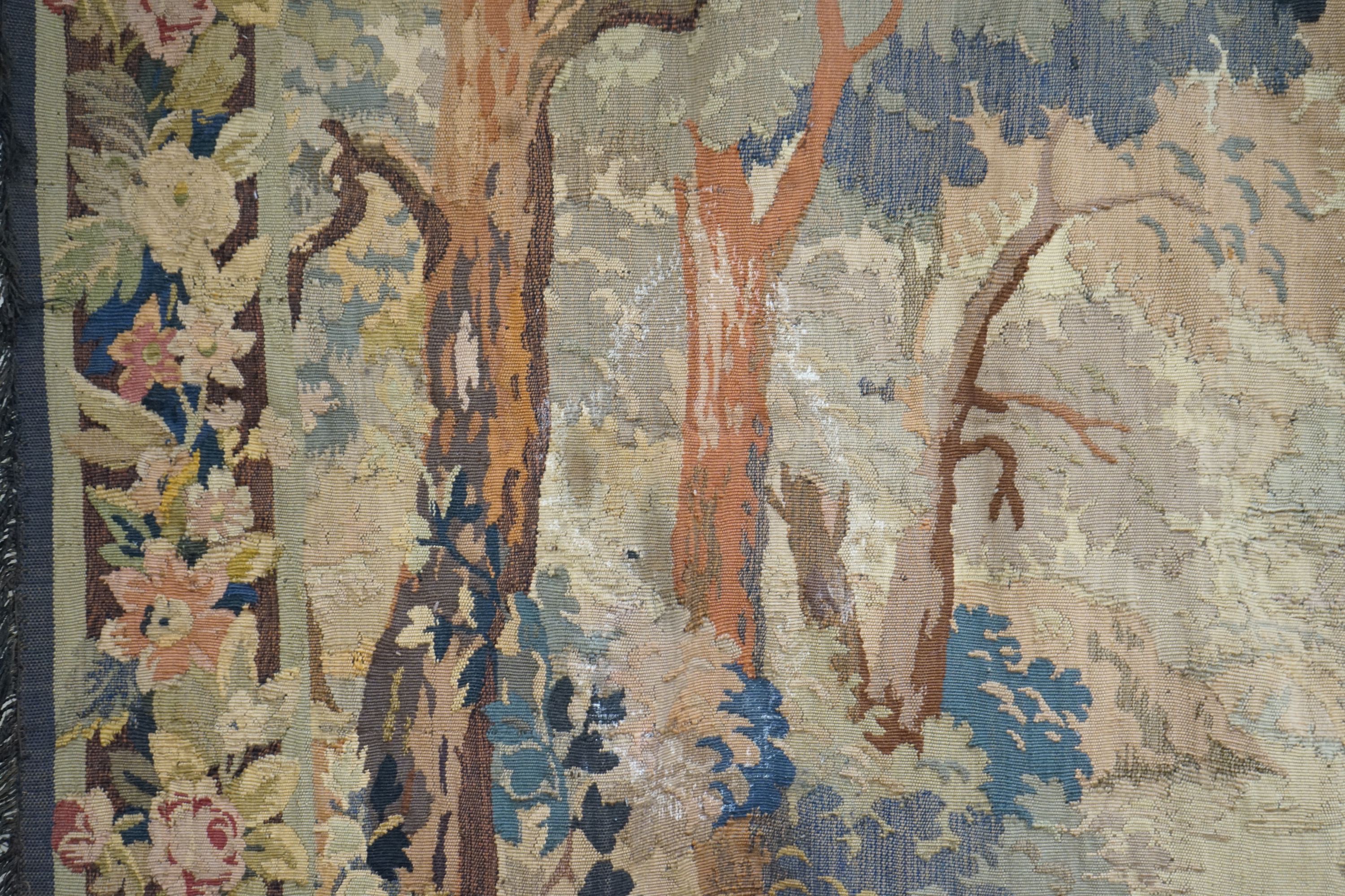 A late 19th / early 20th century French tapestry depicting a woodland scene with trees and flowers - Image 4 of 9
