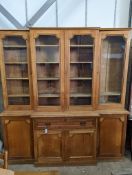 A Victorian pale oak breakfront secretaire library bookcase, length 220cm, depth 47cm, height 230cm