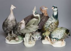 A Rosenthal porcelain model of two guinea fowl impressed model number 205, a Bing & Grondhal limited