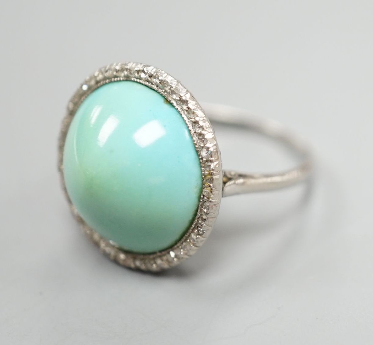 A white metal cabochon turquoise and diamond chip set dress ring, size J/K, gross 6.9 grams. - Image 2 of 4