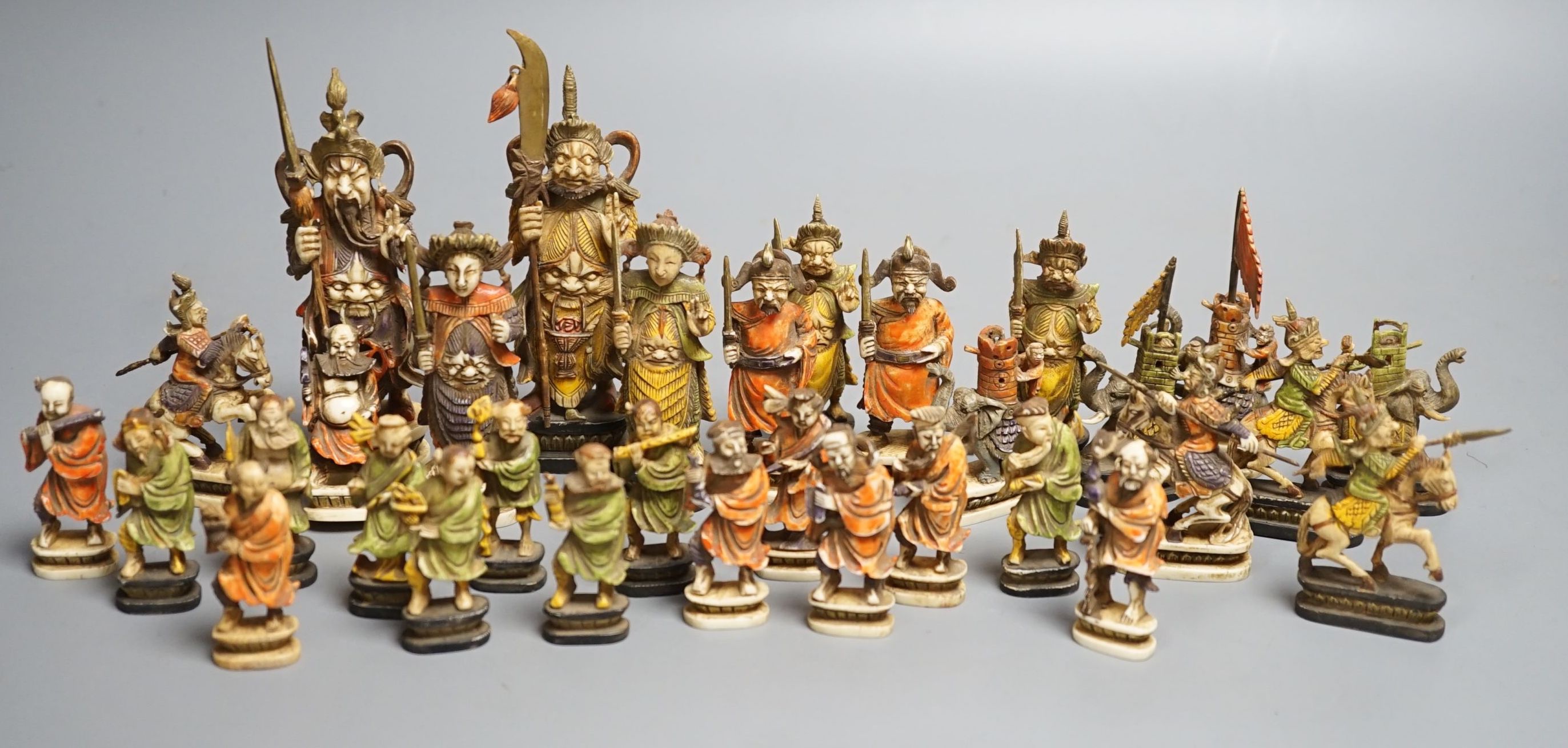 An early 20th century south East Asian stained ivory chess set