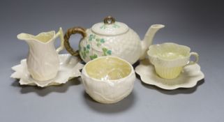 Matching Belleek sugar bowl milk jug and dish together with another Baleek cup and saucer and teapot