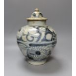 A South East Asian blue and white porcelain jar and cover, possibly Sawankhalok 26cm