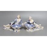 A pair of late 19th century Meissen figural salts, incised numbers ‘2872’ and ‘2873’. 17cm
