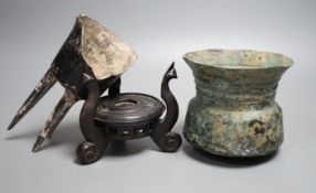 A Han dynasty pottery tripod vessel and a Roman jug