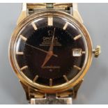A gentleman's steel and gold plated Omega Automatic Constellation black dial wrist watch, on