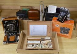 Mixed 20th century photographic equipment to include a cased Zeiss-Ikon Compur plate camera, a