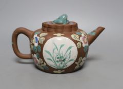 A Chinese Yixing enamelled teapot and cover - 12.5cm tall