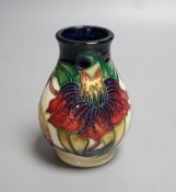 A small Moorcroft Anna Lily pattern vase marked 860 to base 10cm