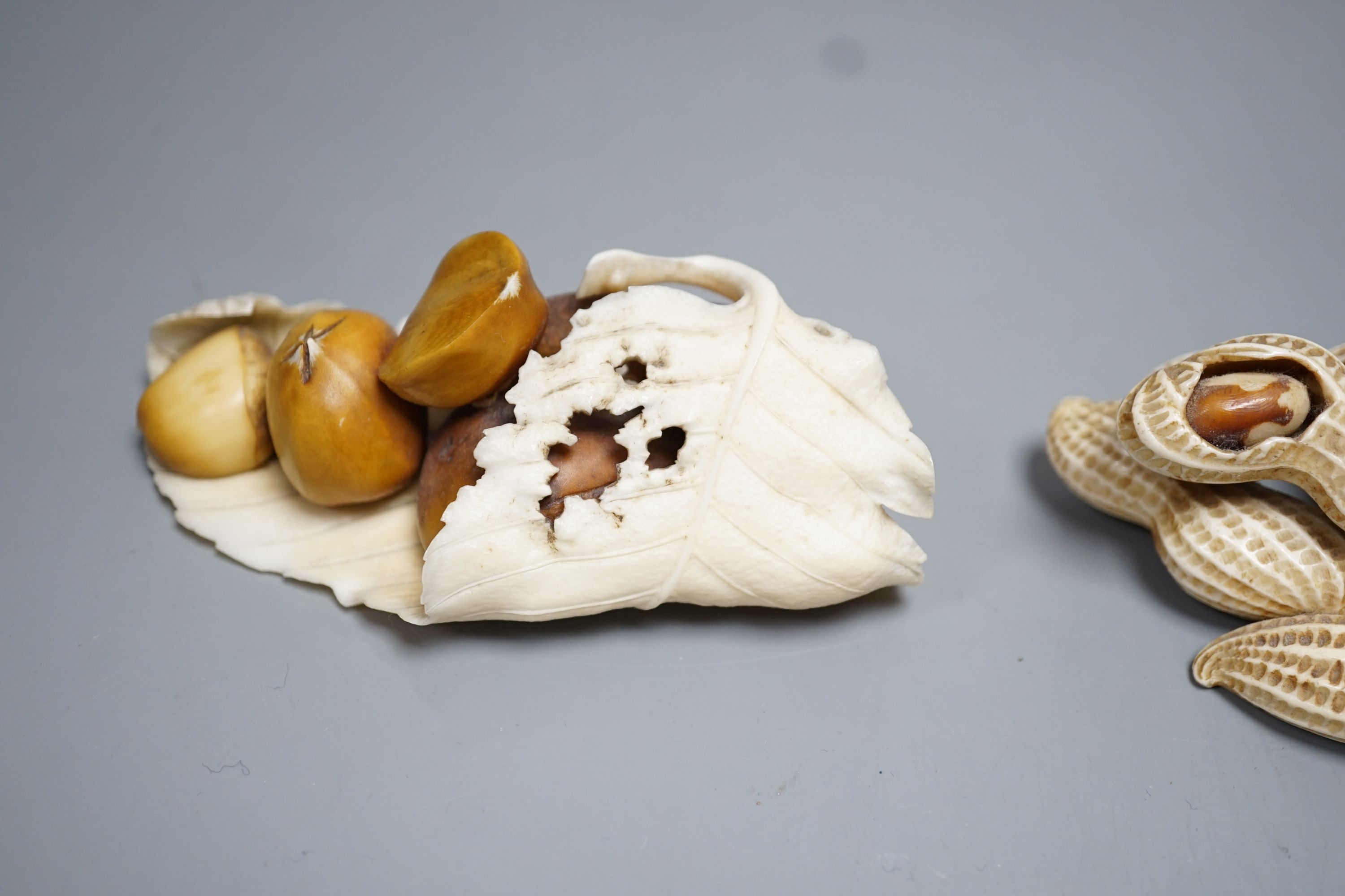 Two Japanese Ivory models of group groups of nuts, first half 20th century, largest 11cm - Image 5 of 7