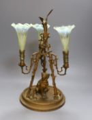 A 19th century 3 branch and spelter epergne decorated with a dog and bird - 41cm tall, with Vaseline