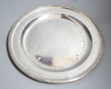 An Austro-Hungarian white metal circular dish with ribbon and reeded boarder, 34cm, 25oz.