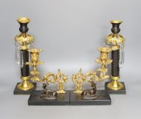 A pair of Empire-style bronze and brass table lustres, 29cm, and a pair of similar candlesticks,