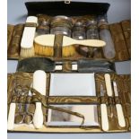 A George V J.C. Vickery leather travelling vanity case, containing five silver mounted toilet
