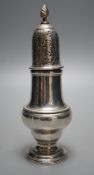 An early George III silver pepper, with interior cap with finial, by John Delmester, London, 1760,