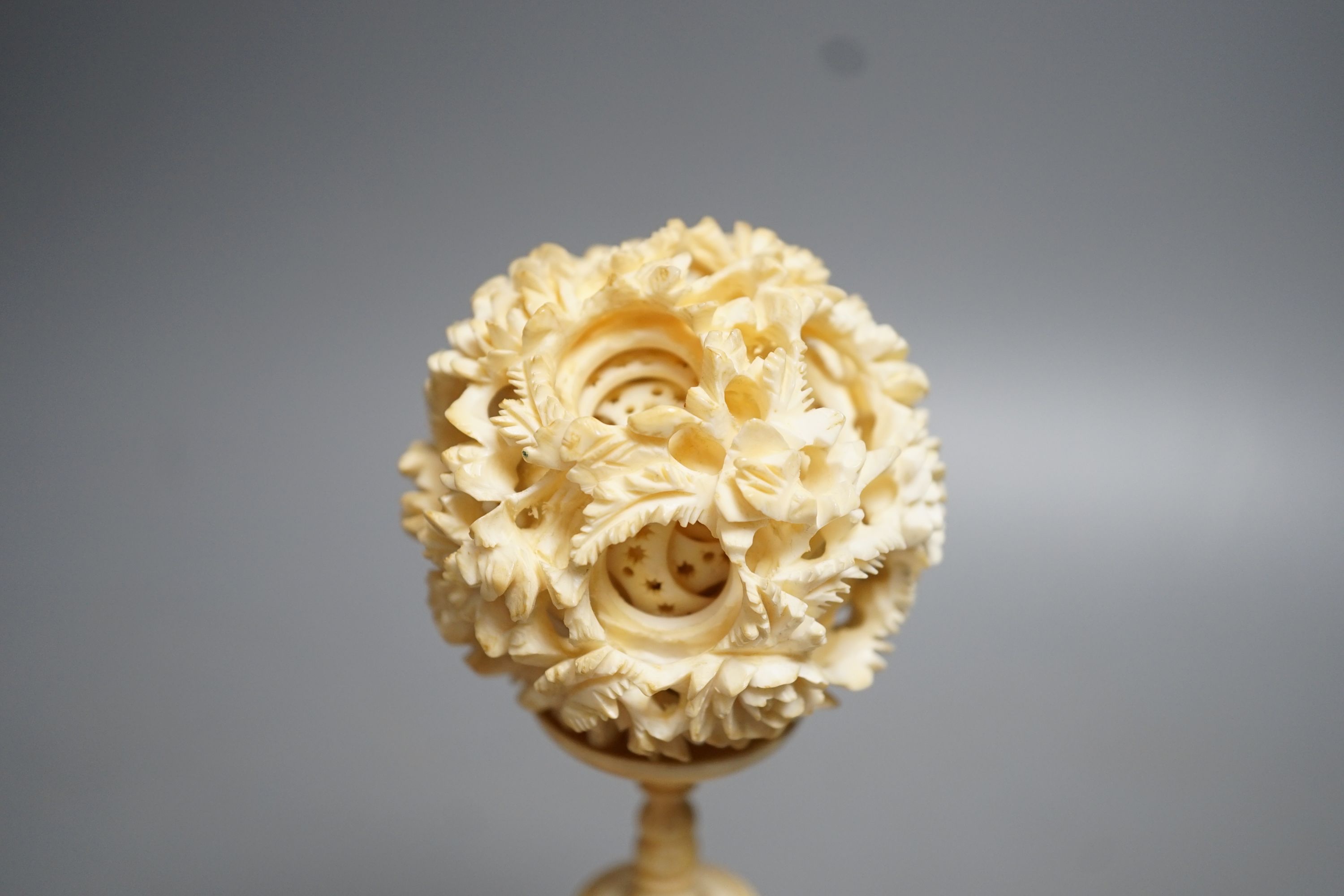 A Chinese ivory concentric puzzle ball and stand, two Chinese ivory snuff bottles and stoppers, - Image 6 of 8