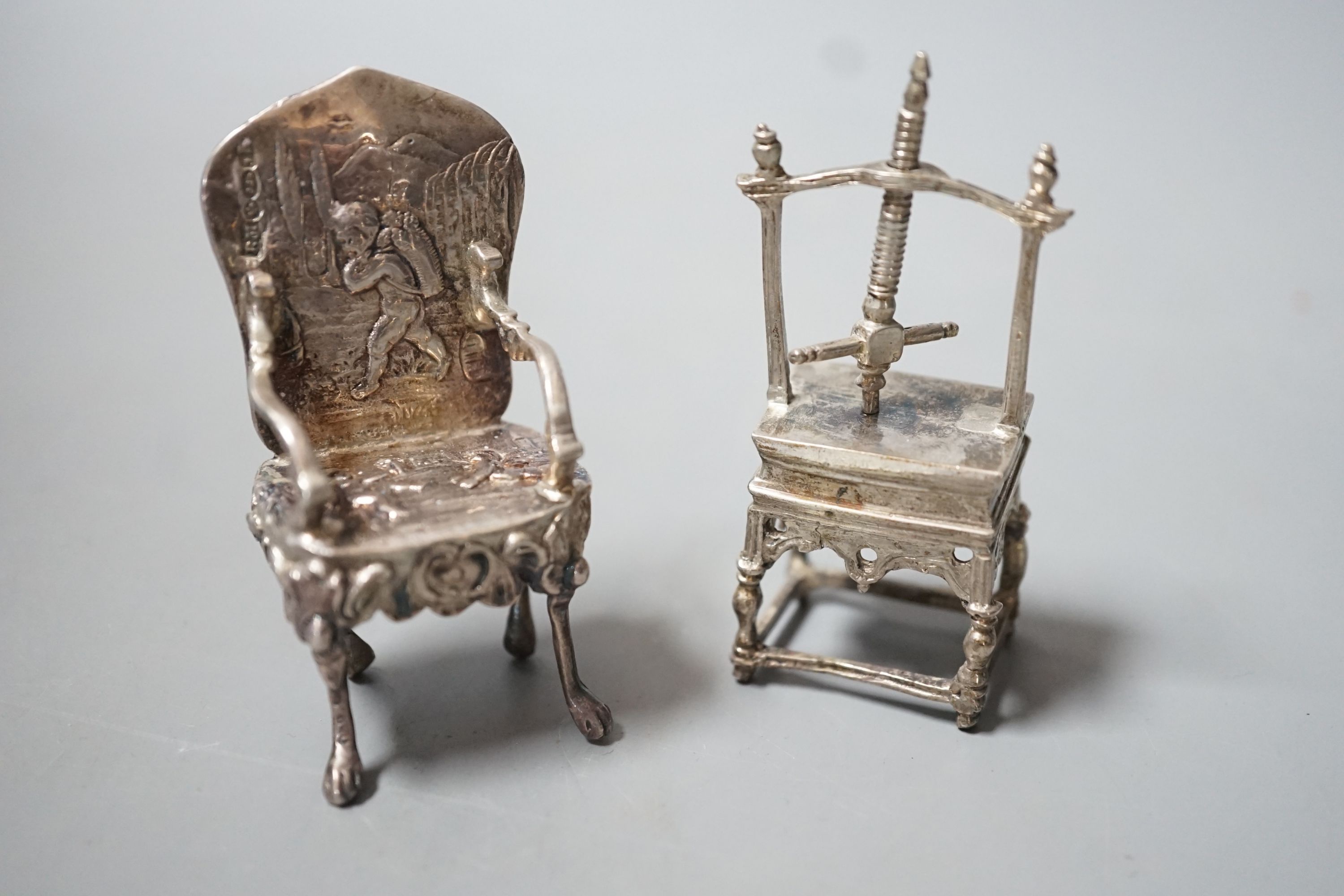 An Edwardian silver miniature model of an armchair, import marks for Glasgow, 1902, 64mm and a white - Image 2 of 3