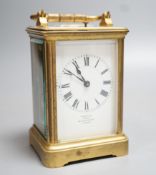 A French gilt brass carriage clock with push repeat, examined by Dent. 13cm (handle down)