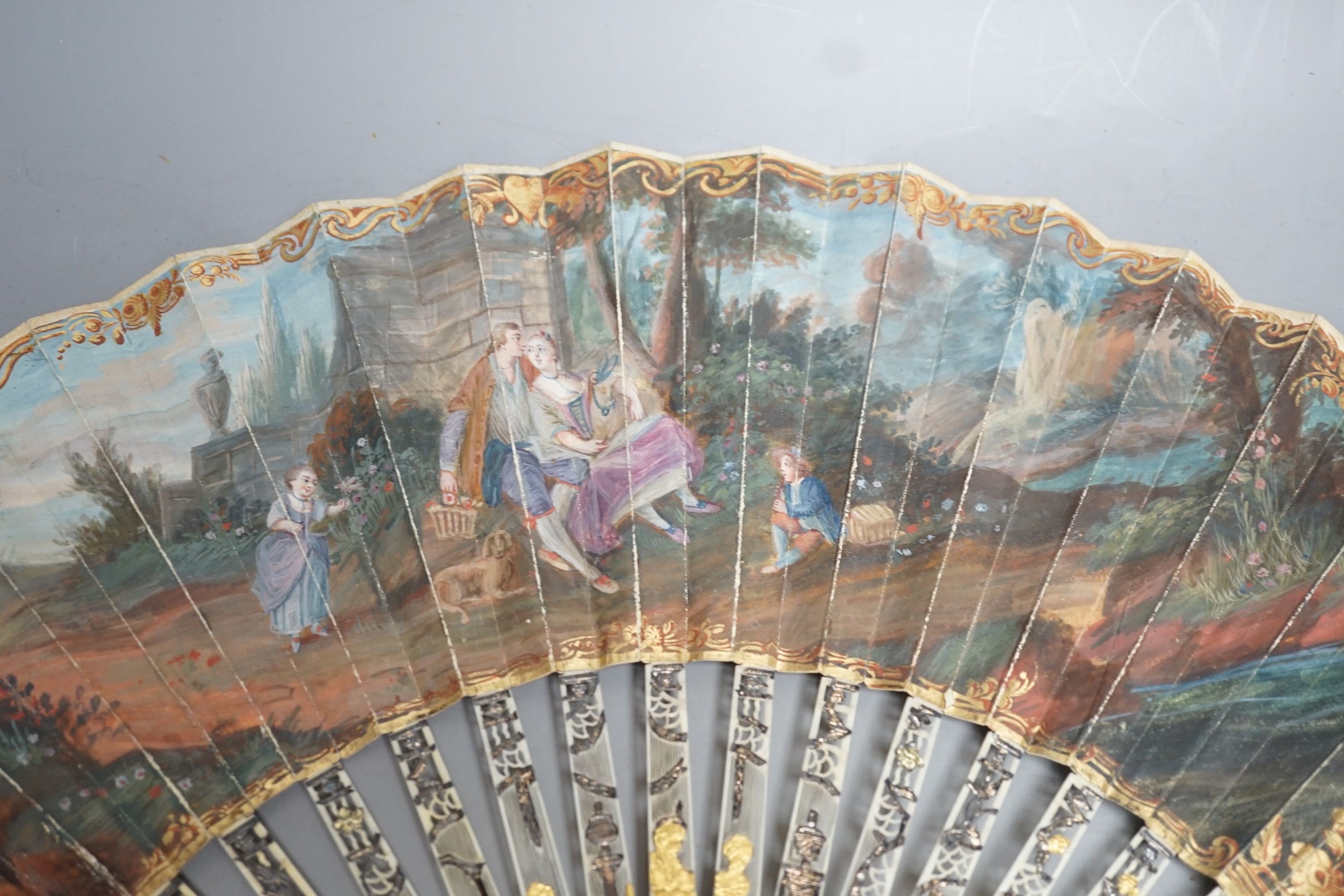 Two late 18th/early 19th century French gilded and silvered ivory and painted paper leaf fans - Image 6 of 9