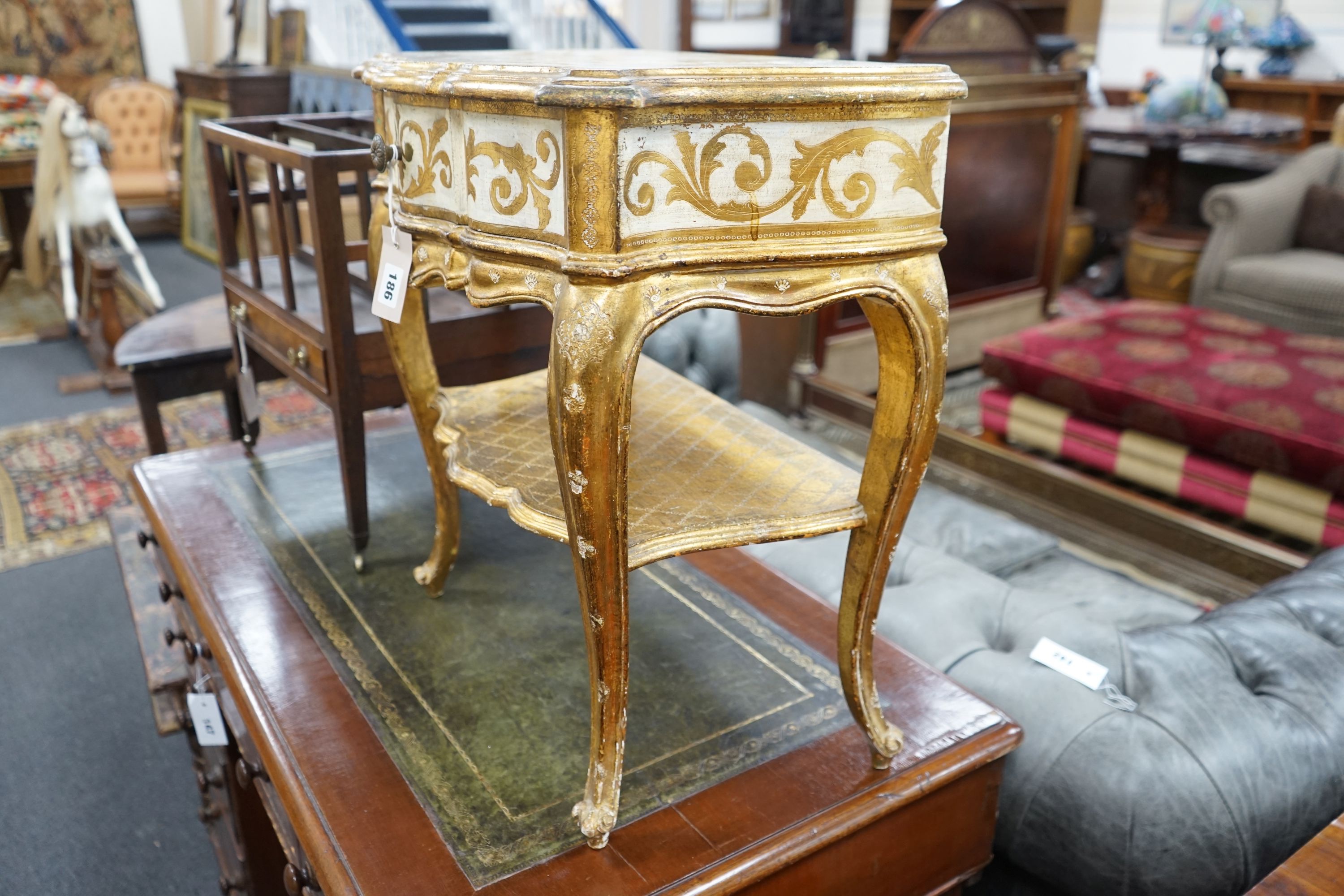 A Florentine gilt and cream painted serpentine two tier side table, width 50cm, depth 34cm, height - Image 2 of 4