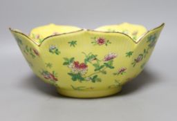 A mid 20th century Chinese yellow ground lotus petalled lobed bowl - 24cm diameter