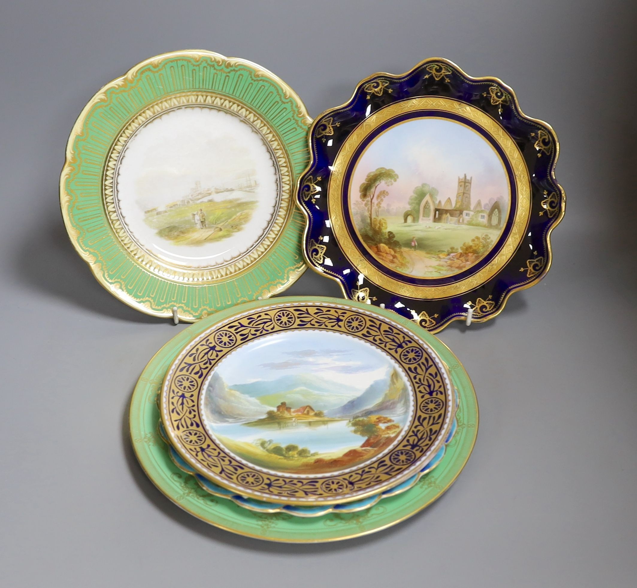 Four English porcelain topographical painted plates, to include Coalport, Royal Worcester and a