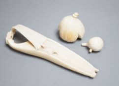 A Japanese ivory model of a partially peeled banana and an ivory model of figs, early 20th