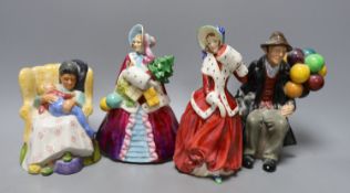 A Royal Worcester figure 'Noel' 2905 and three Royal Doulton figures 'Christmas Morn' HN1992,